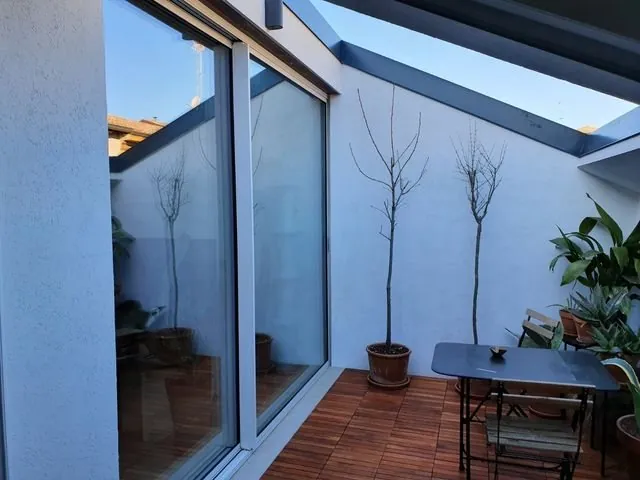 Scorrevole in alluminio su terrazzo con copertura vetrata — Latina e Roma