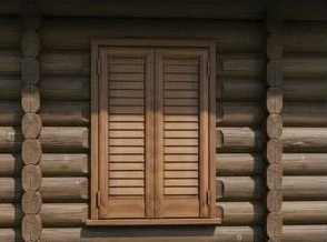 Casa in tronchi di legno con persiane Gruppo Mia