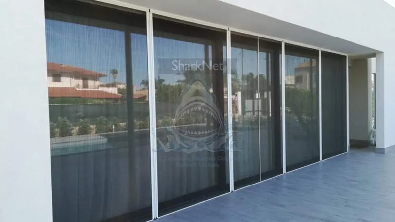 SharkNet Apertura Centrale — zanzariera plissettata orizzontale per grandi luci e porte, Skema Libero Latina e Roma